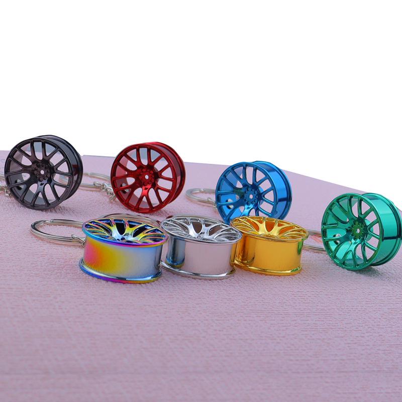 Creative Car Wheel Hub Keychain: Zinc Alloy Metal, Customizable Gift.