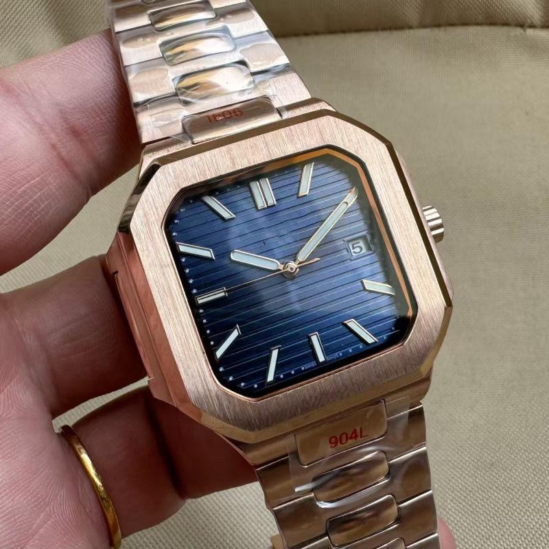 Patek Philippe Nautilus 5821 Men's Gold Automatic Mechanical Watch with Large Dial and Calendar.