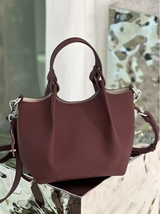 Elegant Women's Genuine Cowhide Bucket Handbag - Versatile Single Shoulder & Crossbody Style.
