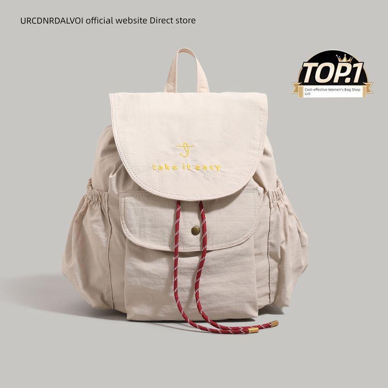 

Ur Japan fashion College Student Class Backpack Women 2025 New Large Capacity Commuter Schoolbag Short-Distance Travel Backpack Beige