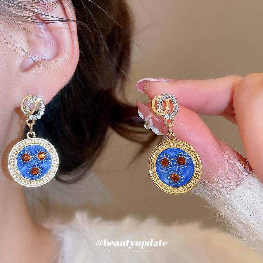 Silberne Ohrhänger im Retro-Stil mit Strasssteinen und geometrischem Tropfenmuster: Hochwertiger, luxuriöser und einzigartiger Statement-Schmuck.