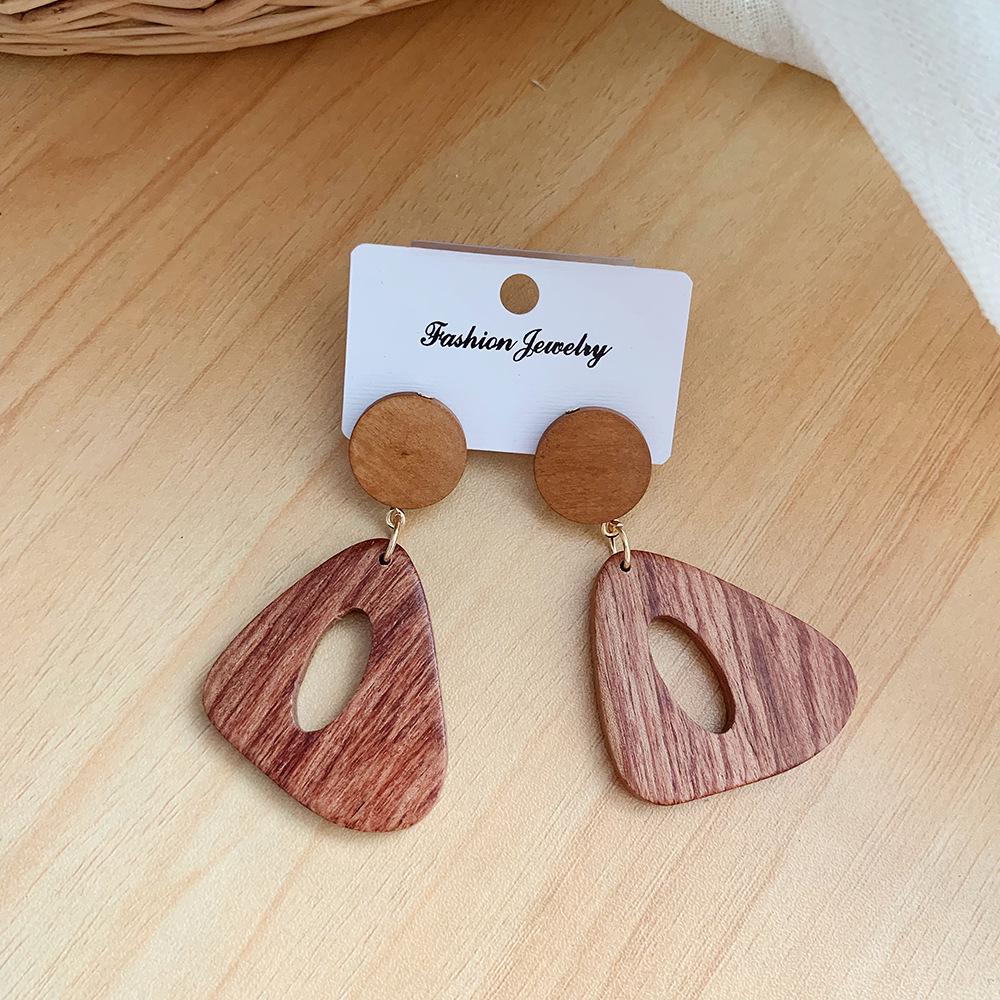 

Корейские ретро асимметричные геометрические деревянные серьги: Проектирование квадратных и длинных бревен