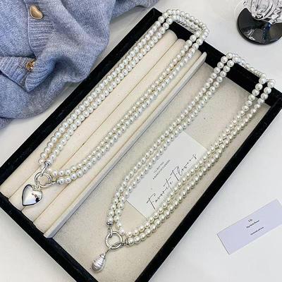 Elegante lange Perlenkette für Damen: Modische, vielseitige, mehrlagige Pulloverkette mit hochwertigem Anhänger für einen schicken und trendigen Look.