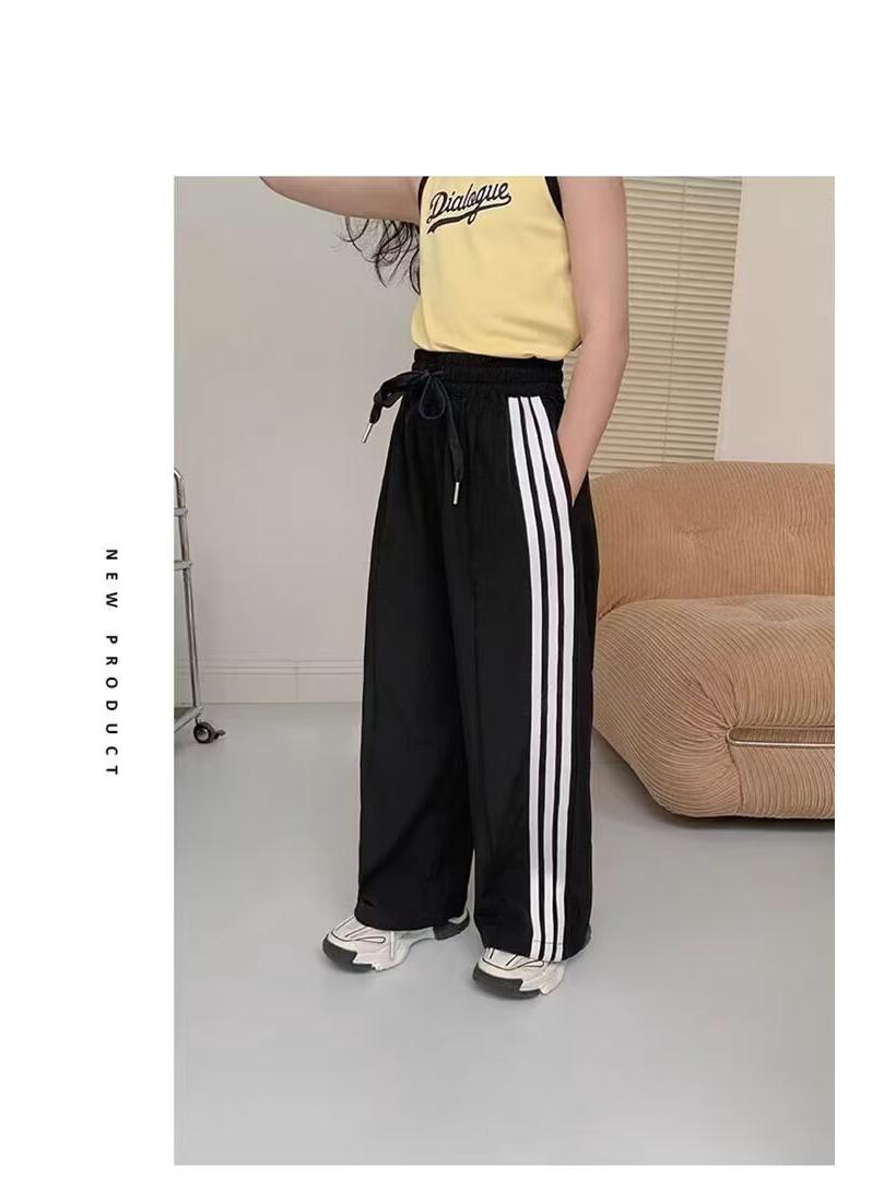 

Стильные спортивные штаны для девочек в корейском стиле свободного кроя - Весенне-осенняя спортивная одежда для подростков 160 cm чёрный