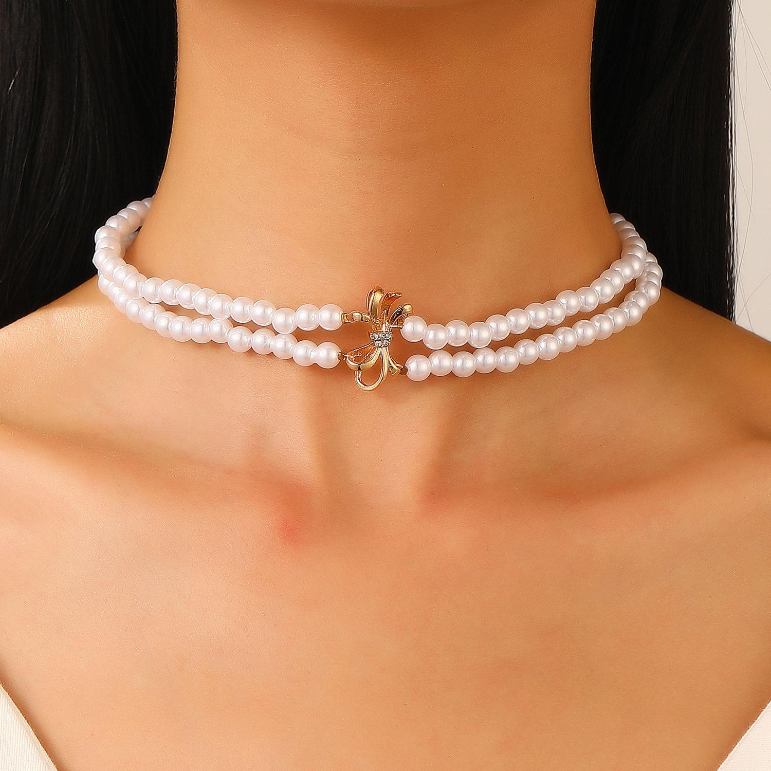 

Жіночий ювелірний набір високого класу в європейському та американському стилі: Двошаровий перловий чокер, намисто на ключицю, браслет та сережки