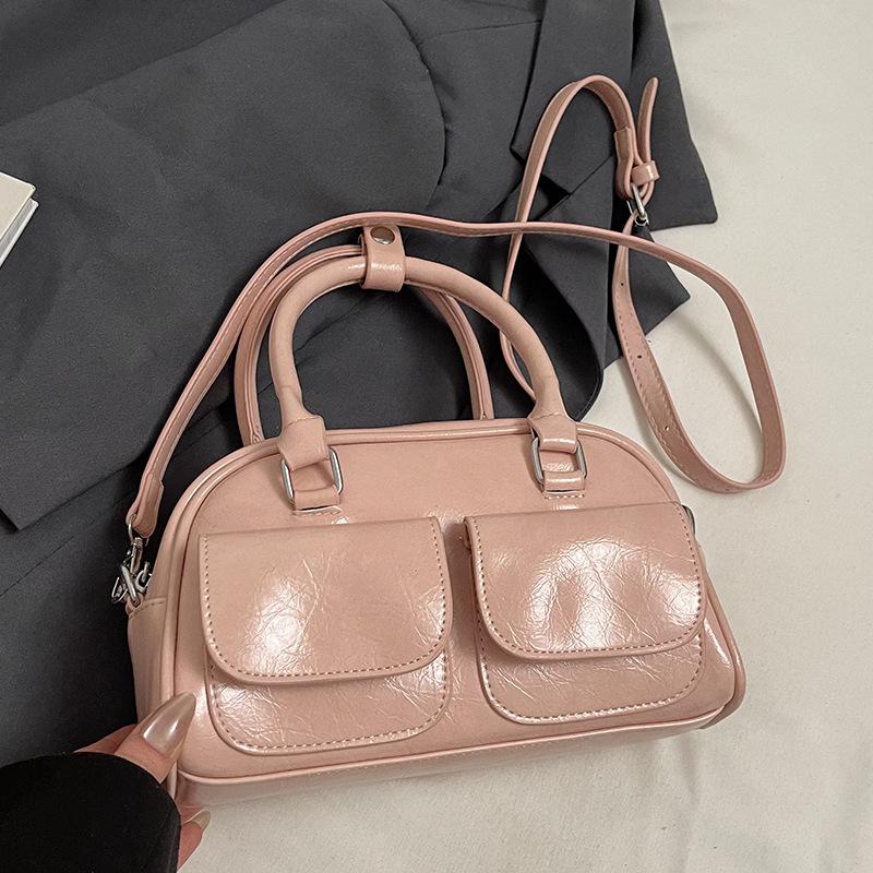 

Оптовая горячая распродажа корейский простой стиль высококачественная текстура портативная сумка-бостон повседневная универсальная нишевая зарубежный стиль сумка-мессенджер