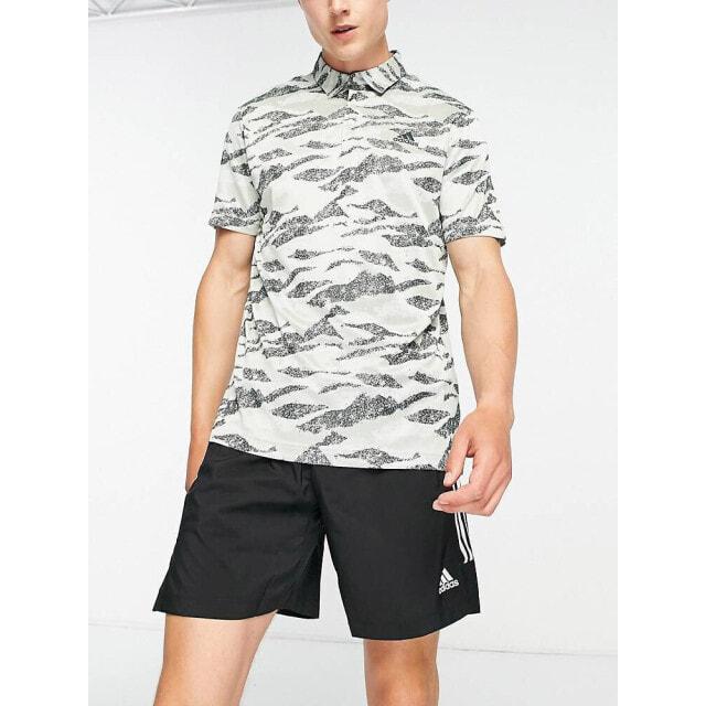 

Зеленая рубашка-поло с камуфляжным принтом adidas Golf Horizon