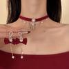 Elegant Pearl Necklace with Diamond-Studded Bow Pendant - Unique Design for Women