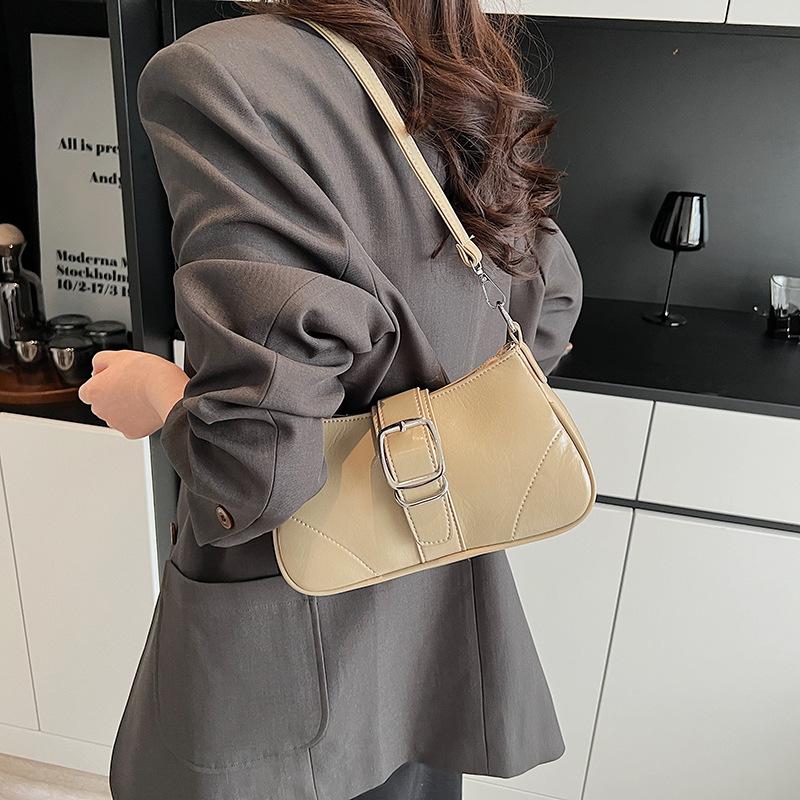 

Super fire small bag women s spring and summer 2025 new retro niche design messenger bag women s shoulder underarm small square bag хакі