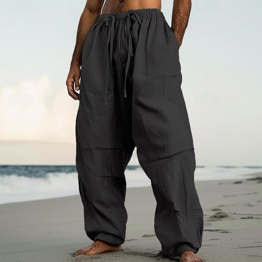 Pantaloni casual da uomo alla moda a tinta unita con coulisse e tasche