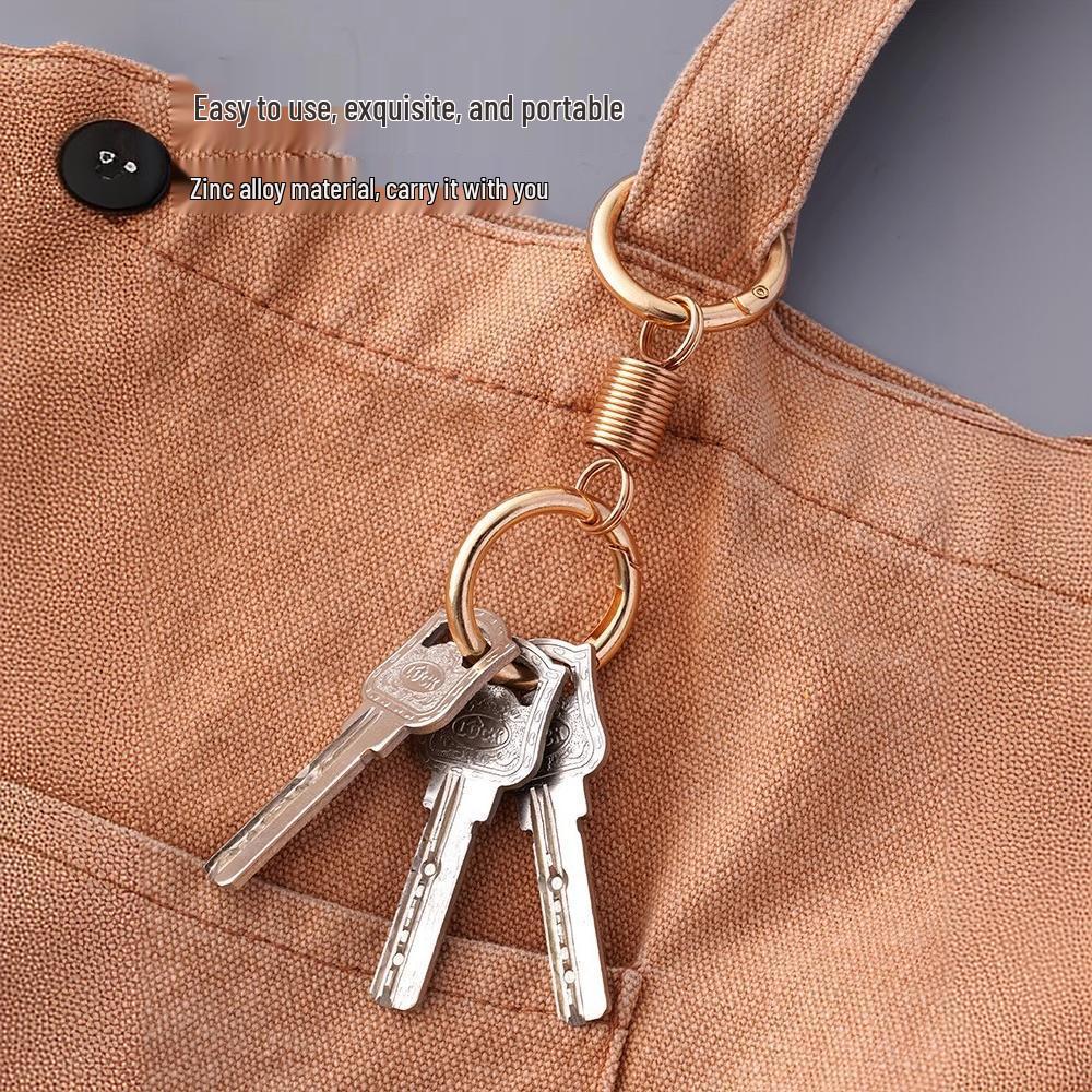 Creative Metal Double Loop Keychain with Pendant – Stylish Spring Ring Design
