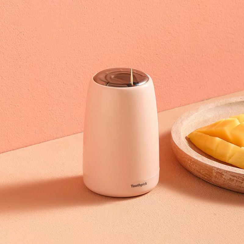 

Креативный автоматический держатель для зубочисток, контейнер для домашнего стола, пластиковый круглый держатель для зубочисток с нажимным механизмом розовый