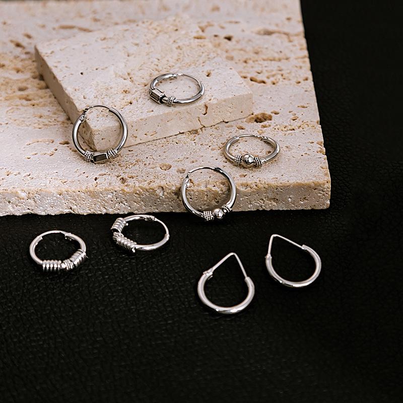 

Korean Retro Round Bead Earrings with Spring Knot Design