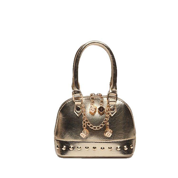 Niche high-end champagne gold shell bag daughter handbag 2025 new versatile commuter shoulder crossbody bag