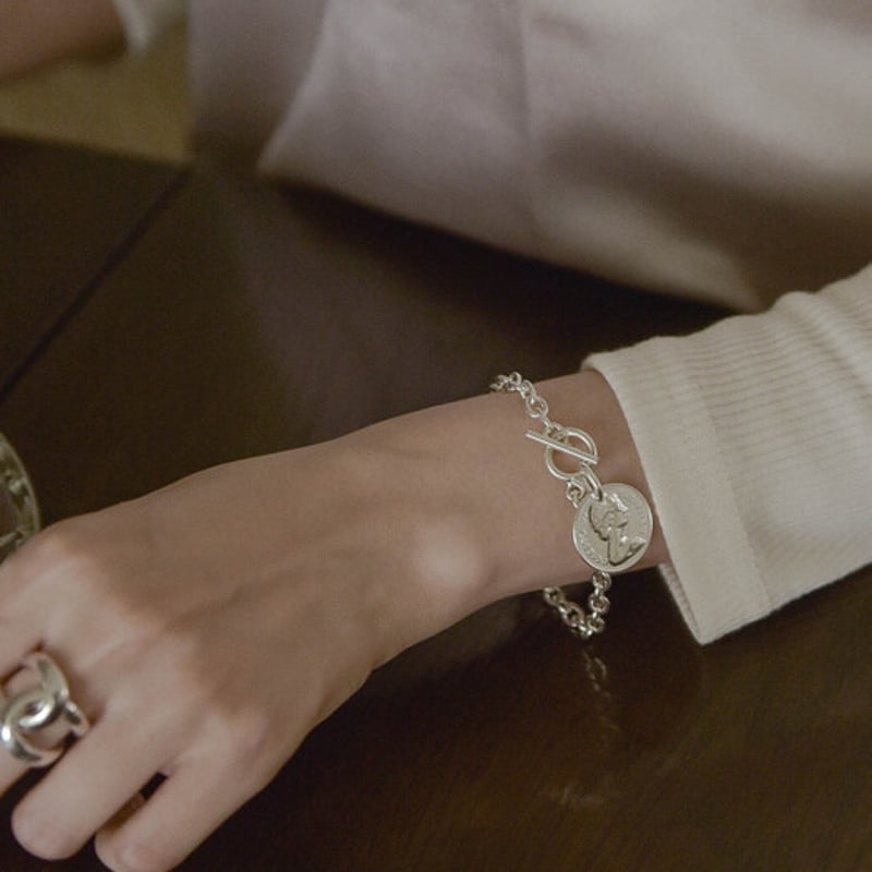 Retro Finger Rolling Coin Bracelet