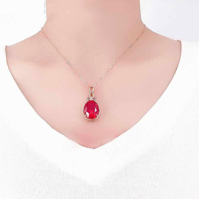Exquisite Russian Purple Gold Plated Rose Gold Egg Surface Shining Red Stone Colored Gold Pendant Fashionable Simple Luxury Necklace