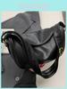 Chic Black Dumpling Bag With Trendy Design And Convenient Back Pocket For Fashionable Daily Use
