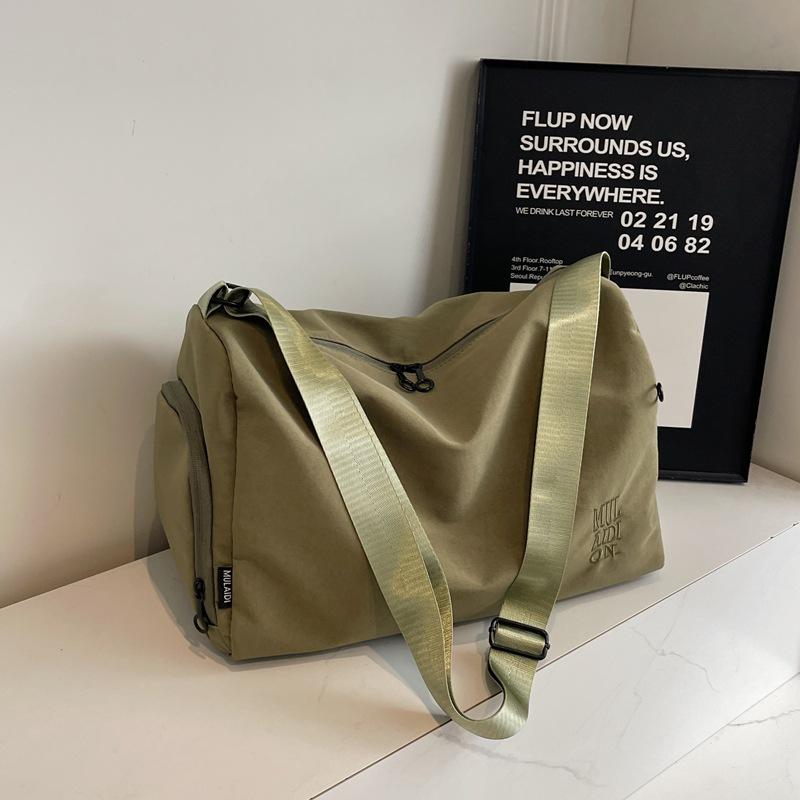 

New travel bag men s large-capacity lightweight portable fitness bag women s wet and dry separation business trip short-distance luggage bag зелёный