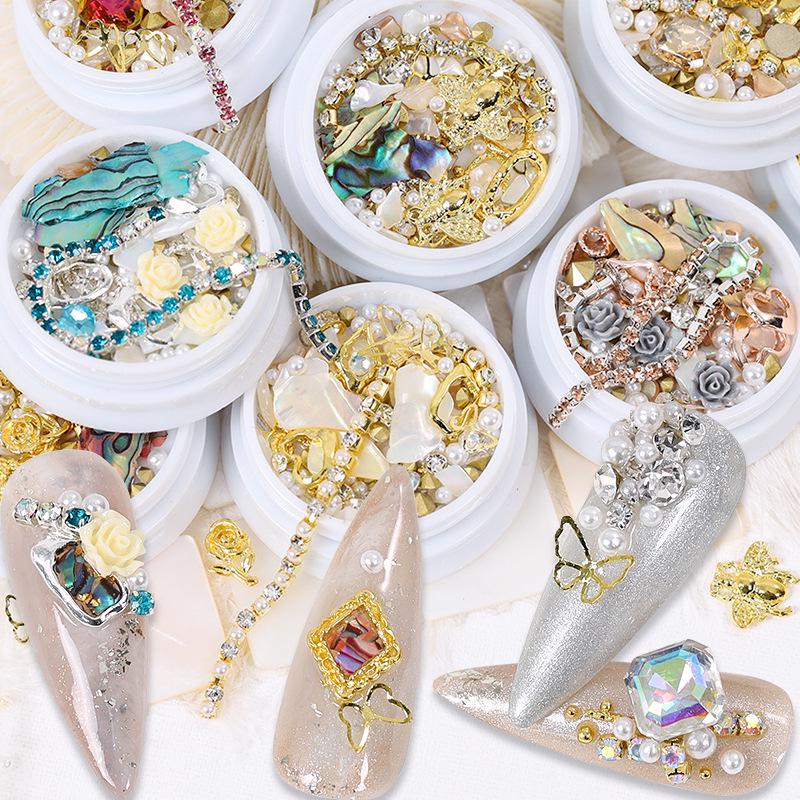 Dolphin Bay Nail Art: Shell Pieces, Rhinestones, Pearls, and Metal Chains Mixed Decorations