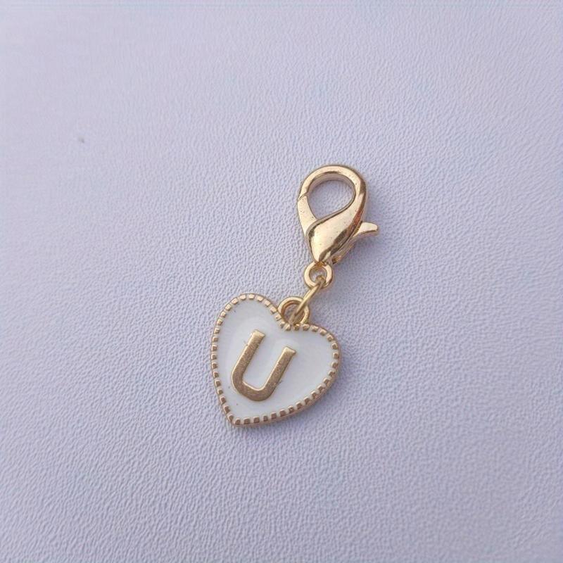 Hetsäljande 26 engelska bokstäver vit dubbelsidig persikohjärta nyckelring hjärtformad legeringsaccessoarprydnad