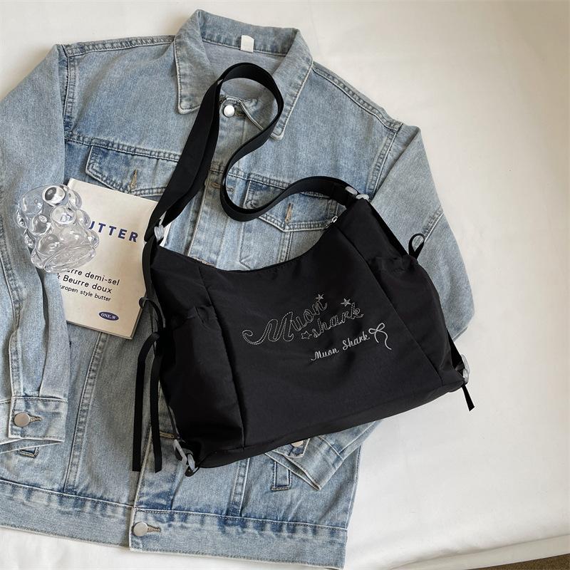 Tote bag women's 2024 new large-capacity commuting letter foreign feeling college students commute to class shoulder backpack