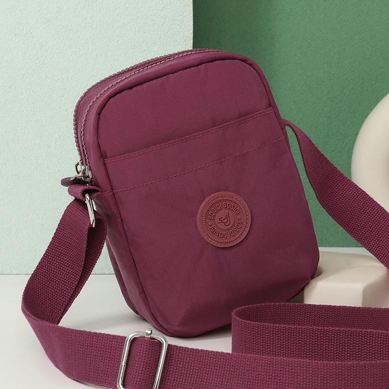Compact Nylon Crossbody Bag with Double Zipper Closure Adjustable Strap Small Casual Purse for Daily Travel