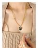Chic Minimalist Women's Peach Heart Pendant Necklace: European & American Style, Sexy Layered Design with Drip Oil & Steel Beads