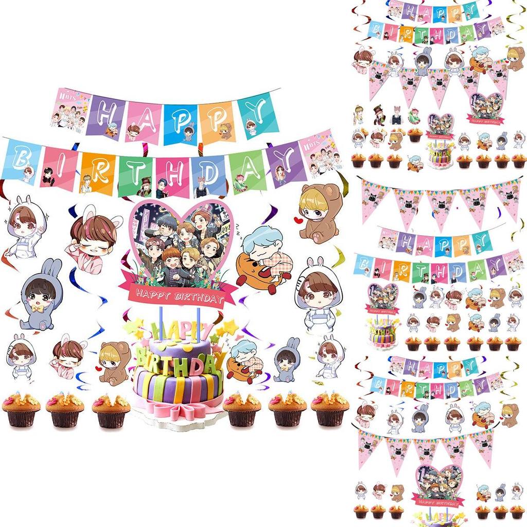 Fournitures de fête d'anniversaire festives sur le thème de BTS avec un cake topper coloré et des cupcake toppers joyeux