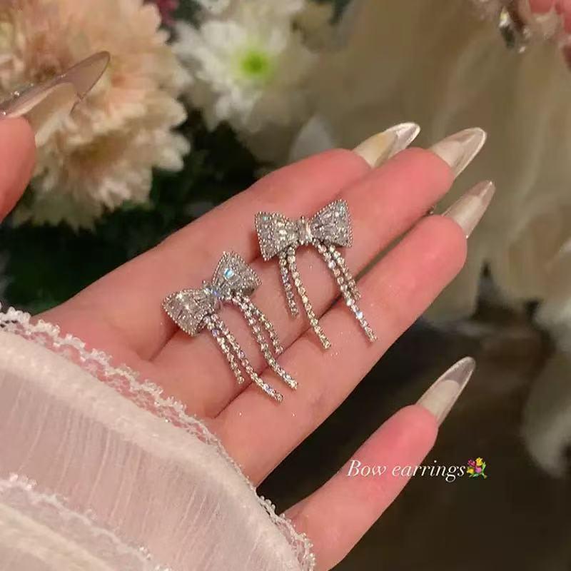 Exquisite Copper Zircon Tassel Bow Earrings - Luxury Style, Versatile and High-End Design for Women