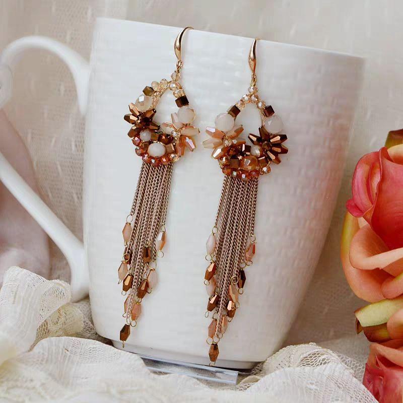 Boucles d'oreilles perlées Cristal Rondeur Chaîne à pompon Tricot à la main Bohème Alliage Mode Simple Boucles d'oreilles perles de riz