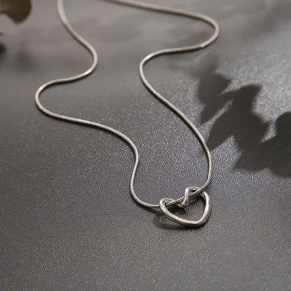 Women's Heart Pendant Clavicle Necklace - Simple, Hollow, Heart-Shaped Design
