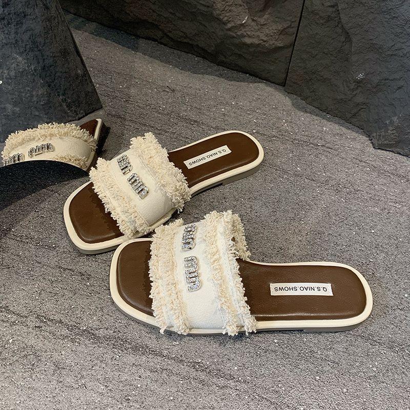2025 New Pure Desire Style Flat-bottomed Slippers Women's Summer Wear Fashionable and Versatile One-word Drag High-end Sense Fairy Wind Beach