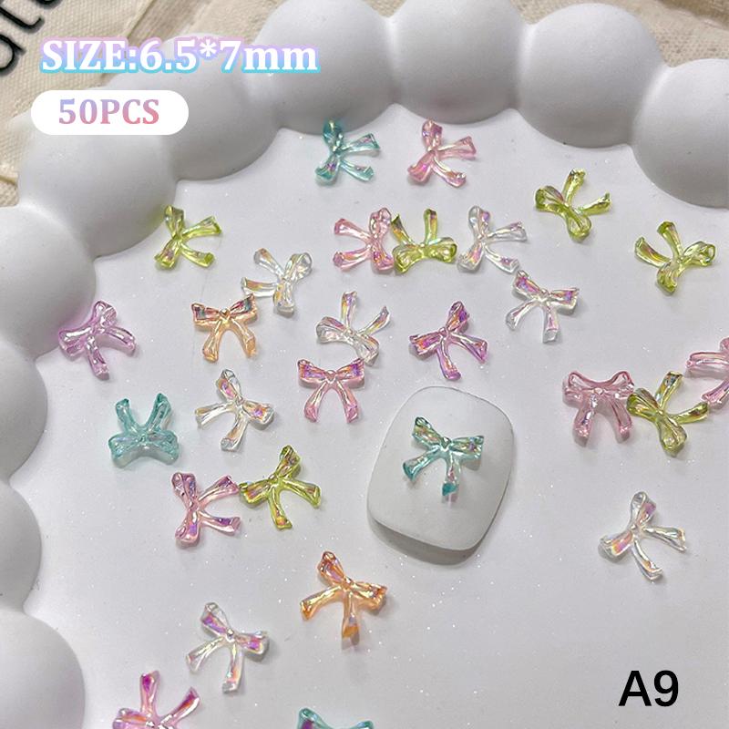 

50Pcs Colorful Bow Nail Charms Nails Art Accessory Illusionary AB Color Resin Ribbon Bows Manicures Decoration Charm