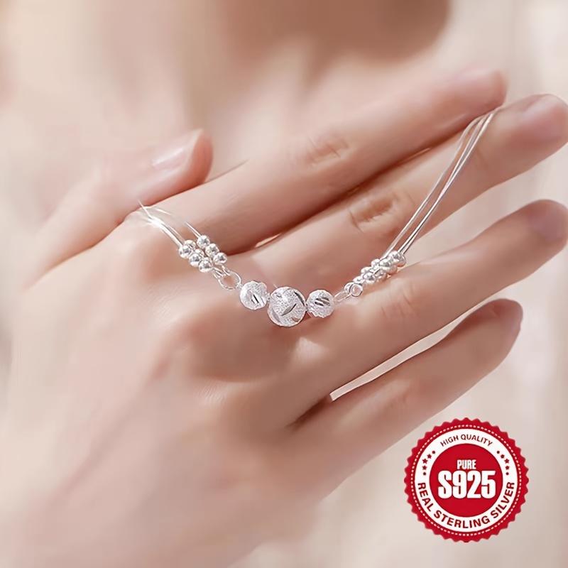 Elegant 925 sterling silver bracelet with delicate small beads and a thoughtful spring clasp design, suitable for daily wear