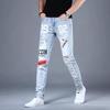 Men's Slim Light Blue European-Style Skinny Jeans with Korean Print, Perfect for Spring and Autumn.