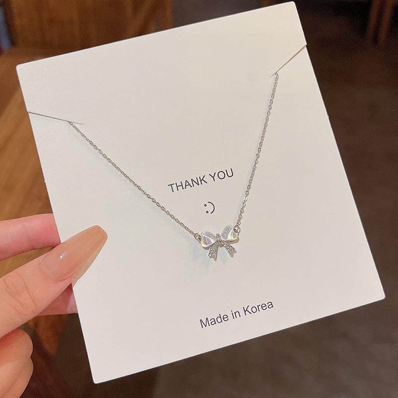 Light luxury niche opal bow necklace female tide super fairy versatile temperament small fresh titanium steel collarbone chain