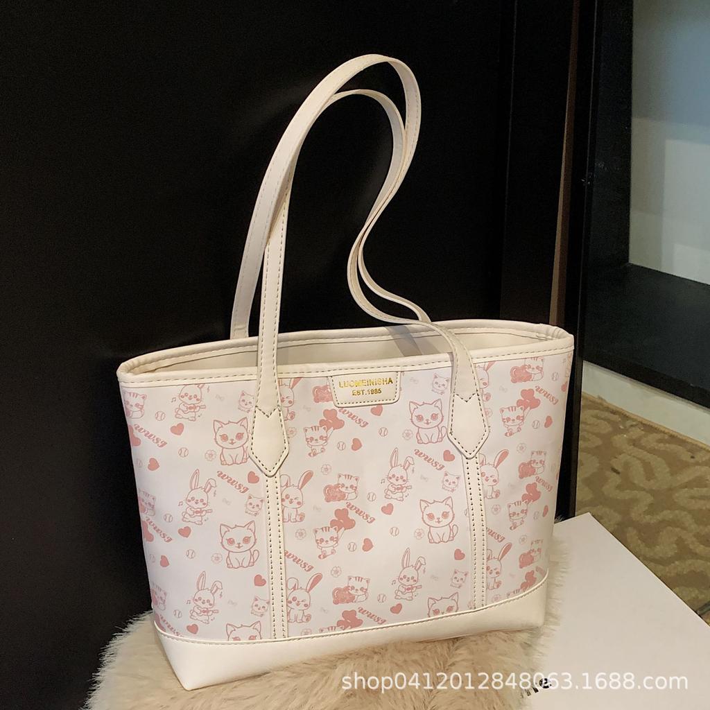 Simple temperament large capacity tote bag women's 2025 spring and summer new small fresh printing shoulder commuter armpit bag