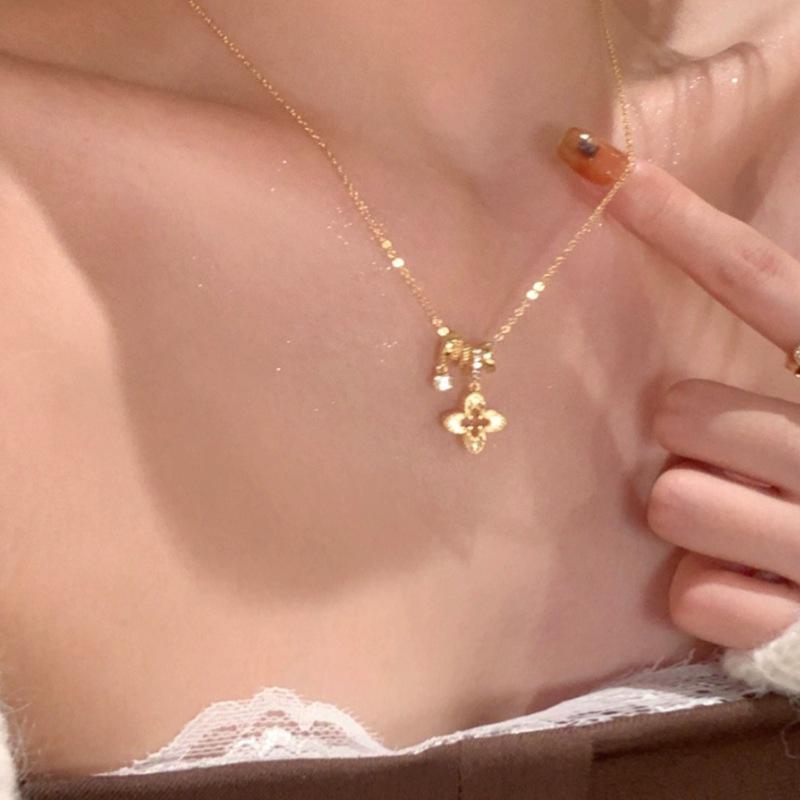 Exquisite Zirconia Flower Pendant Necklace with Round Ring and Sweater Chain - Light Luxury Petal Collarbone Accessory.