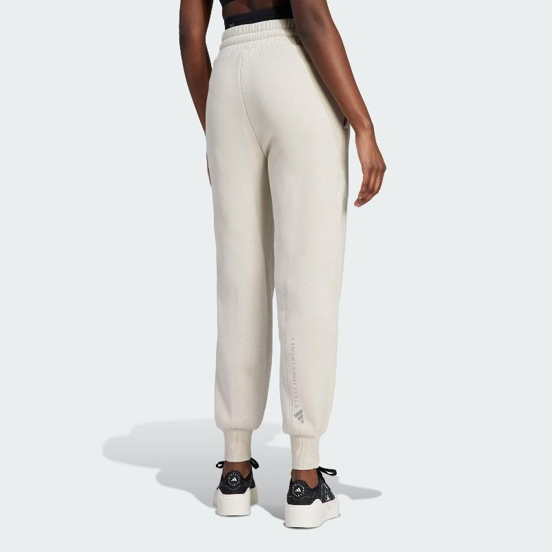 adidas Pantalón de chándal X Stella McCartney con logotipo de marca compartida para mujer, parte inferior, blanco roto IQ2640