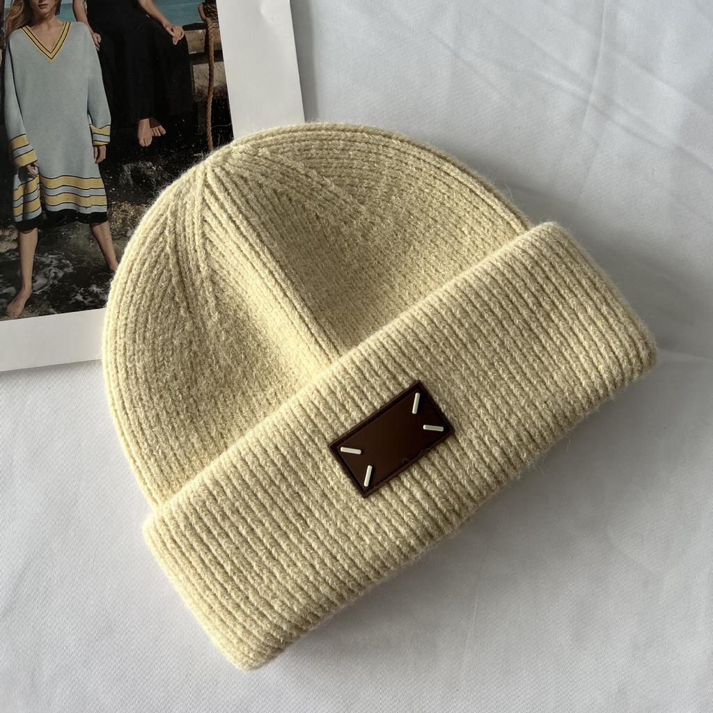 Winter new thick wool knitted hat warm versatile bag head hat flanged ear protection fashion wool hat women's cold hat