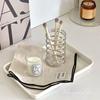 Stainless Steel Spring Storage Rack: Pen, Makeup Brush, Comb, and Toothbrush Holder
