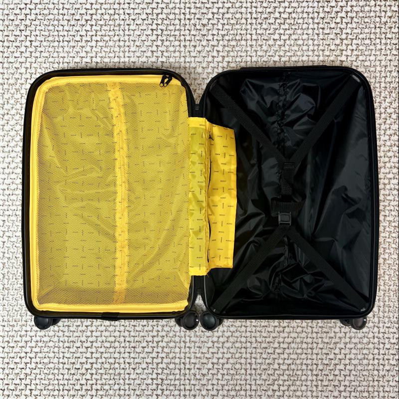 Embossed Italian 20" Carry-on Suitcase with Universal Wheels and Customizable Lock.