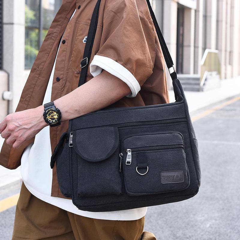 Hochwertige Herren-Canvas-Umhängetasche mit Doppeltaschen für Reisen