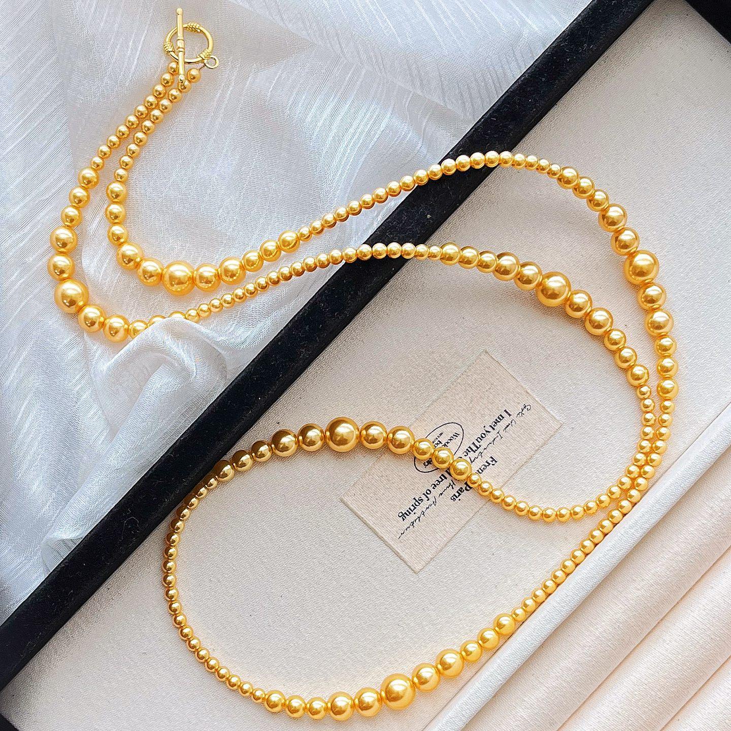 Autumn And Winter Maillard High-Gloss High-Quality Shijia Pearls Gradually Change Smile Collarbone Chain Sweater Chain Necklace Female