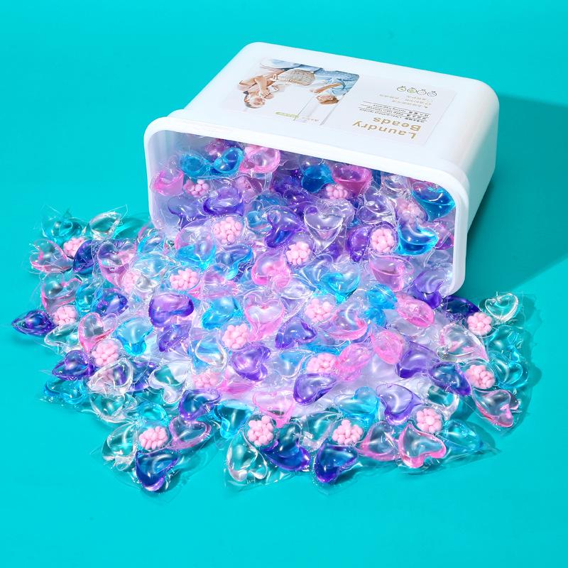 Fünf-in-Eins Waschmittel-Pods: Lang anhaltender Duft, Fleckenentfernung, Weichspülen und konzentrierte Waschmittelperlen.