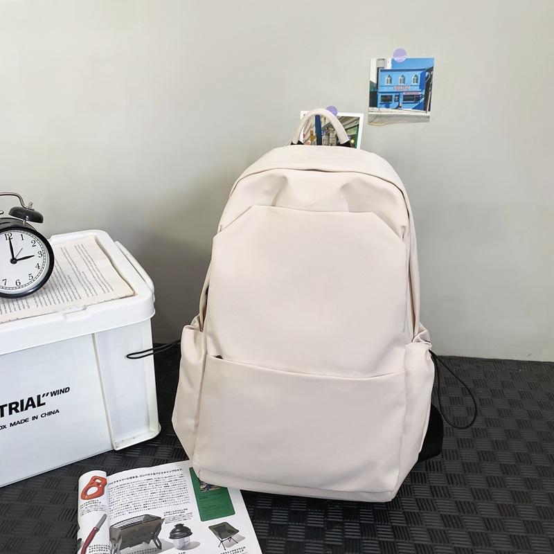 Sac d'école nouveau sac d'école style collège couleur unie grande capacité sac à dos étudiante simple sac à dos femme