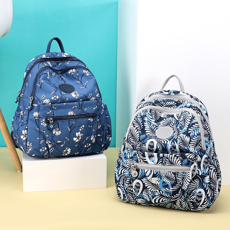 New Lightweight Waterproof Backpack with Large Capacity for Women's Outdoor Leisure Travel Bag and Student Backpack