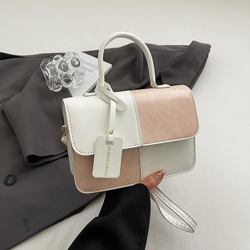 

Spring fashion trend high-end sense light luxury shoulder messenger bag contrasting color design sense beautiful temperament handbag women s bag розовый