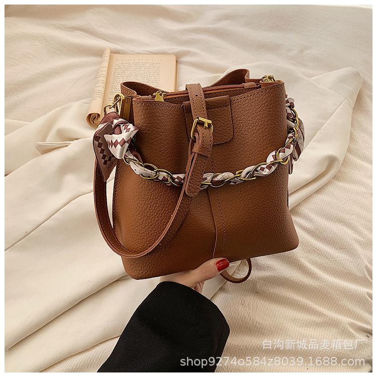 

This year s popular foreign silk scarf bucket bag women s 2025 new fashion and versatile crossbody bag commuter shoulder bag