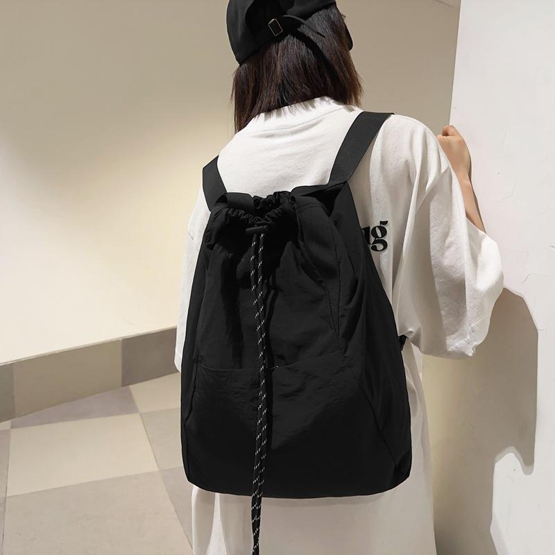 Schoolbag, lightweight sports backpack, women's drawstring drawstring pouch, multi-use handheld, crossbody bag, travel backpack, men's student